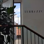 Ingresso al terrazzo Hotel Accademia Trento con scritta Terrazzo